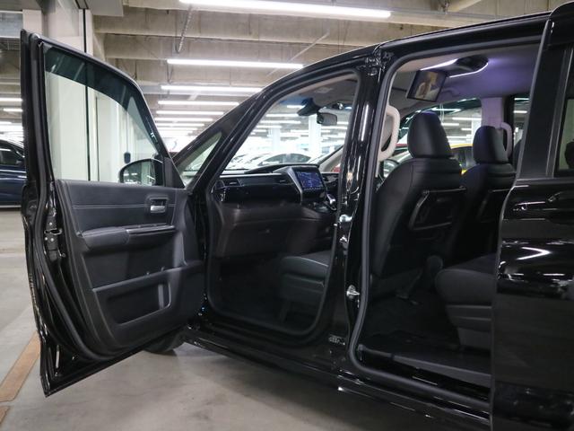 フリードハイブリッド ハイブリッド・モデューロＸ　ホンダセンシング　寒冷地仕様　後席モニター　衝突軽減ブレーキ　車線逸脱警報　アダプティブクルーズ　ＥＴＣ２．０　純正９インチナビ　両側パワースライド　バックカメラ　ＢＴオーディオ　フルセグ　スマートキー　ＬＥＤランプ（22枚目）