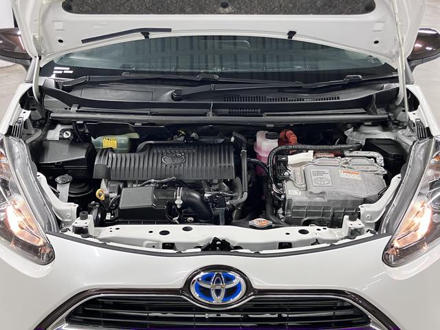 シエンタ ハイブリッドＧ　トヨタセーフティセンス　フリップダウンモニター　両側電動スライドドア　純正ナビ　バックカメラ　Ｂｌｕｅｔｏｏｔｈオーディオ　フルセグＴＶ　ＣＤ・ＤＶＤ　ＥＴＣ　スマートキー　オートエアコン　電動格納ドアミラー　サイドバイザー（21枚目）