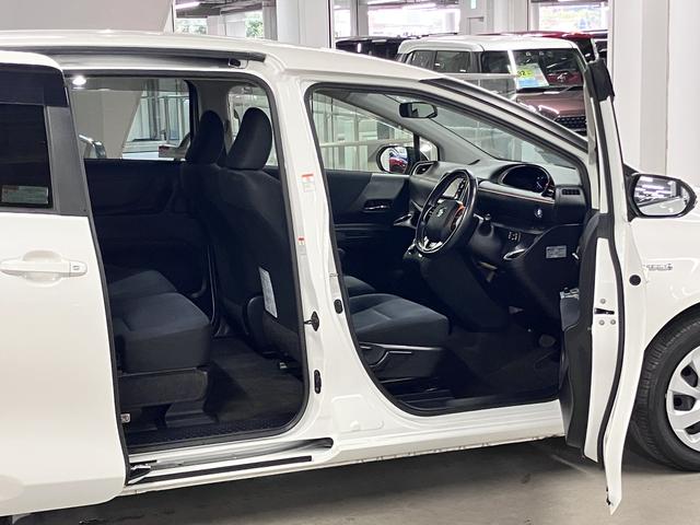 シエンタ ハイブリッドＧ　トヨタセーフティセンス　フリップダウンモニター　両側電動スライドドア　純正ナビ　バックカメラ　Ｂｌｕｅｔｏｏｔｈオーディオ　フルセグＴＶ　ＣＤ・ＤＶＤ　ＥＴＣ　スマートキー　オートエアコン　電動格納ドアミラー　サイドバイザー（22枚目）