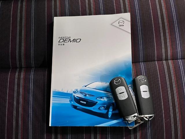 デミオ 13C-V スマートエディションII スマートHIDパッケージ イクリプスナビ ETC TV CD再生 ディスチャージヘッドランプ フォグランプ アドバンストキー スペアキー・取扱説明書 スタッドレスタイヤ&14インチAW 電動格納ミラー(17枚目)