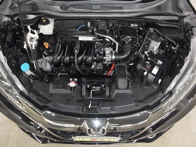 ヴェゼル ハイブリッドＲＳ・ホンダセンシング　寒冷地仕様　衝突軽減ブレーキ　車線逸脱警報　アダプティブクルーズ　パドルシフト　ＥＴＣ　アルパイン８型ナビ　シートヒーター　バックカメラ　ＢＴオーディオ　フルセグ　スマートキー　オートリトラミラー　ＬＥＤランプ（21枚目）