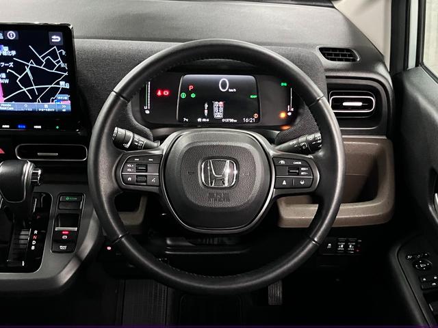 フリード ｅ：ＨＥＶエアー　ＥＸ　ワンオーナー　純正エアロバンパー・テールゲートスポイラー　マルチビューカメラ　ＢＳＩ・後退出庫サポート　純正１１．４インチナビ　ホンダセンシング　ＥＴＣ　シートヒーター　両側パワースライドドア　パーキングセンサー（11枚目）