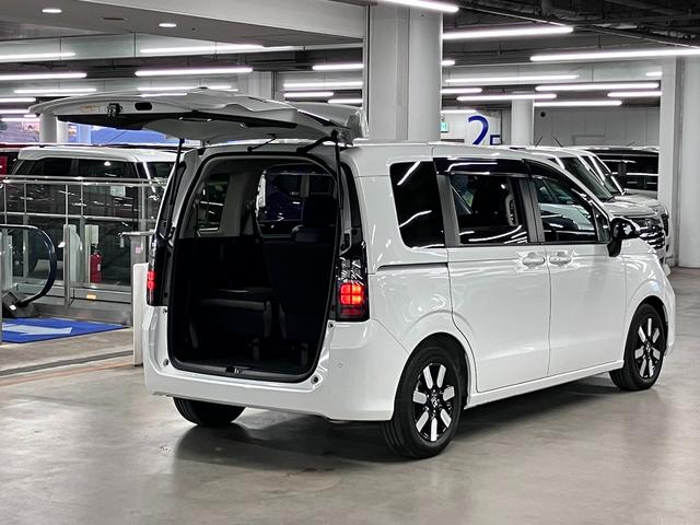 フリード ｅ：ＨＥＶエアー　ＥＸ　ワンオーナー　純正エアロバンパー・テールゲートスポイラー　マルチビューカメラ　ＢＳＩ・後退出庫サポート　純正１１．４インチナビ　ホンダセンシング　ＥＴＣ　シートヒーター　両側パワースライドドア　パーキングセンサー（26枚目）