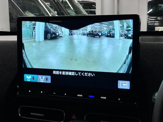 フリード ｅ：ＨＥＶエアー　ＥＸ　ワンオーナー　純正エアロバンパー・テールゲートスポイラー　マルチビューカメラ　ＢＳＩ・後退出庫サポート　純正１１．４インチナビ　ホンダセンシング　ＥＴＣ　シートヒーター　両側パワースライドドア　パーキングセンサー（29枚目）