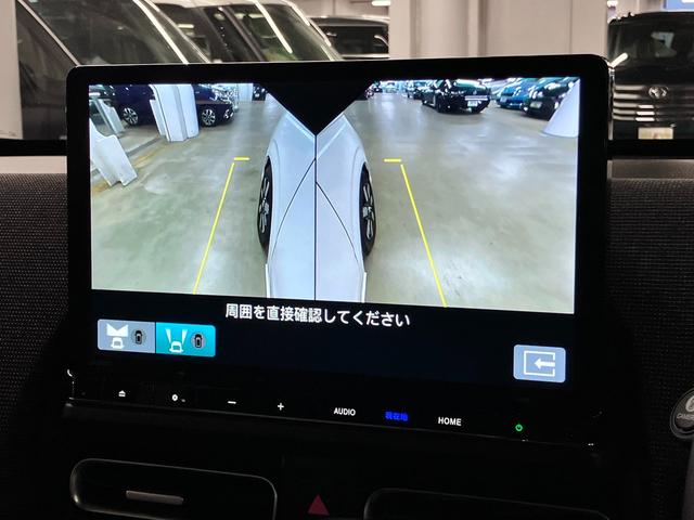 フリード ｅ：ＨＥＶエアー　ＥＸ　ワンオーナー　純正エアロバンパー・テールゲートスポイラー　マルチビューカメラ　ＢＳＩ・後退出庫サポート　純正１１．４インチナビ　ホンダセンシング　ＥＴＣ　シートヒーター　両側パワースライドドア　パーキングセンサー（30枚目）