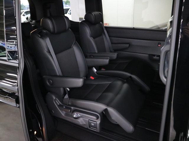 ステップワゴン e:HEVスパーダ 登録済未使用車 ホンダセンシング 15.6インチリヤモニター 11.4インチナビ マルチビューカメラ 後退出庫サポート・BSI シートヒーター オットマン コンビシート パワーバックドア 両側電動スライドドア 全列USB LEDライト(14枚目)