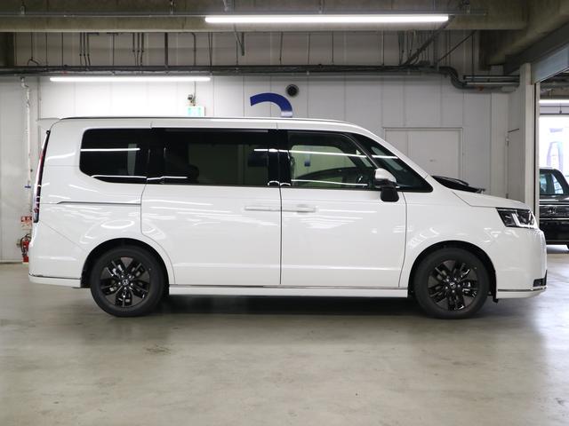 ステップワゴン e:HEVスパーダ 登録済未使用車 ホンダセンシング 15.6インチリヤモニター 11.4インチナビ マルチビューカメラ 後退出庫サポート・BSI シートヒーター オットマン コンビシート パワーバックドア 両側電動スライドドア 全列USB LEDライト(9枚目)