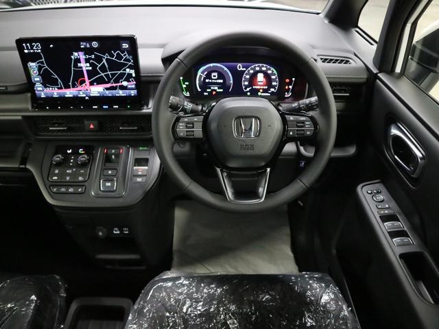 ステップワゴン e:HEVスパーダ 登録済未使用車 ホンダセンシング 15.6インチリヤモニター 11.4インチナビ マルチビューカメラ 後退出庫サポート・BSI シートヒーター オットマン コンビシート パワーバックドア 両側電動スライドドア 全列USB LEDライト(11枚目)