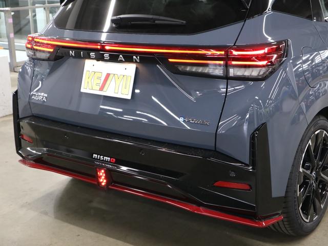 オーラ ニスモ　登録済未使用車　ＢＯＳＥサウンドシステム　インテリミラー　ＮＣ９インチナビ　アラウンドビューモニター　プロパイロット　ＢＳＷ・ＲＣＴＡ　ワイヤレス充電　ＥＴＣ２．０　ＢＴオーディオ　フルセグＴＶ　専用ハーフレザーシート　アダプティブＬＥＤ（50枚目）