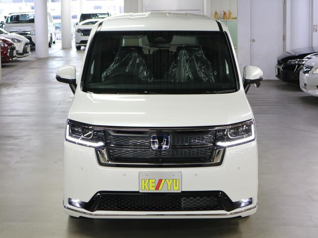 ステップワゴン e:HEVスパーダ 登録済未使用車 ホンダセンシング 15.6インチリヤモニター 11.4インチナビ マルチビューカメラ 後退出庫サポート・BSI シートヒーター オットマン コンビシート パワーバックドア 両側電動スライドドア 全列USB LEDライト(6枚目)