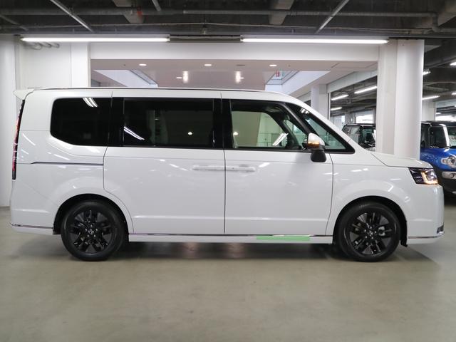 ステップワゴン e:HEVスパーダ 登録済未使用車 ホンダセンシング 15.6インチリヤモニター 11.4インチナビ マルチビューカメラ 後退出庫サポート・BSI シートヒーター オットマン コンビシート パワーバックドア 両側電動スライドドア 全列USB LEDライト(9枚目)