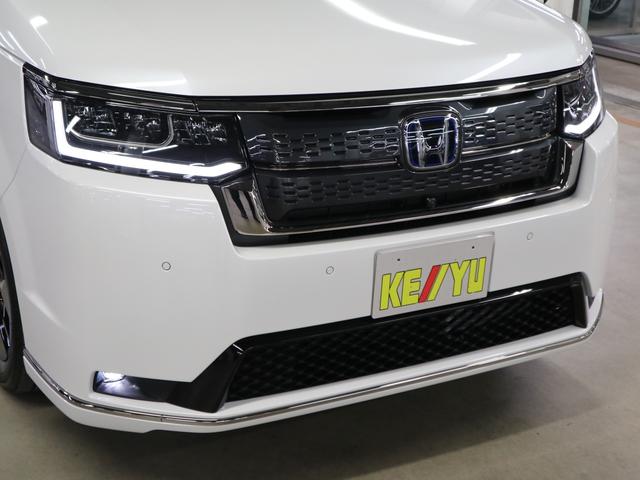 ステップワゴン e:HEVスパーダ 登録済未使用車 ホンダセンシング 15.6インチリヤモニター 11.4インチナビ マルチビューカメラ 後退出庫サポート・BSI シートヒーター オットマン コンビシート パワーバックドア 両側電動スライドドア 全列USB LEDライト(52枚目)