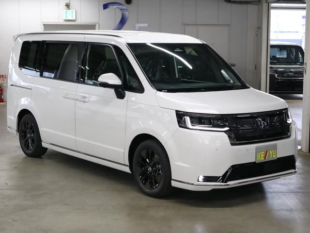 ステップワゴン e:HEVスパーダ 登録済未使用車 ホンダセンシング 15.6インチリヤモニター 11.4インチナビ マルチビューカメラ 後退出庫サポート・BSI シートヒーター オットマン コンビシート パワーバックドア 両側電動スライドドア 全列USB LEDライト(5枚目)