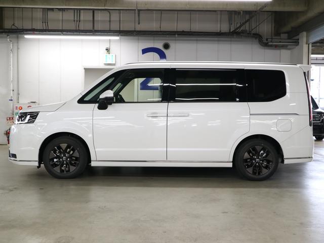 ステップワゴン e:HEVスパーダ 登録済未使用車 ホンダセンシング 15.6インチリヤモニター 11.4インチナビ マルチビューカメラ 後退出庫サポート・BSI シートヒーター オットマン コンビシート パワーバックドア 両側電動スライドドア 全列USB LEDライト(10枚目)