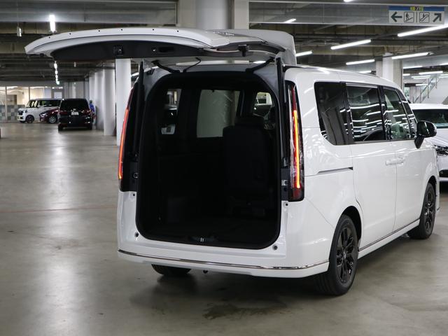 ステップワゴン e:HEVスパーダ 登録済未使用車 ホンダセンシング 15.6インチリヤモニター 11.4インチナビ マルチビューカメラ 後退出庫サポート・BSI シートヒーター オットマン コンビシート パワーバックドア 両側電動スライドドア 全列USB LEDライト(20枚目)