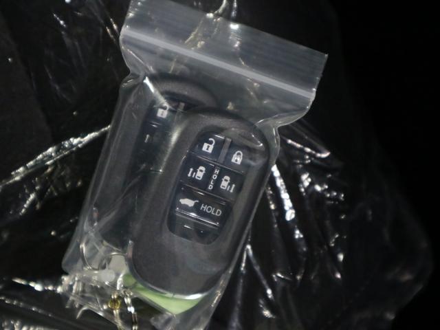 ステップワゴン e:HEVスパーダ 登録済未使用車 ホンダセンシング 15.6インチリヤモニター 11.4インチナビ マルチビューカメラ 後退出庫サポート・BSI シートヒーター オットマン コンビシート パワーバックドア 両側電動スライドドア 全列USB LEDライト(50枚目)