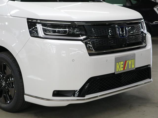 ステップワゴン e:HEVスパーダ 登録済未使用車 ホンダセンシング 15.6インチリヤモニター 11.4インチナビ マルチビューカメラ 後退出庫サポート・BSI シートヒーター オットマン コンビシート パワーバックドア 両側電動スライドドア 全列USB LEDライト(52枚目)
