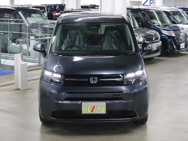 フリード e:HEVエアー EX 登録済み未使用車 マルチビューカメラ 純正11.4インチナビ ETC2.0 BSI・後退出庫サポート アダプティブドライビングビーム 両側電動スライドドア シートヒーター レザー調コンビシート リアクーラー パーキングセンサー 専用アルミ(11枚目)