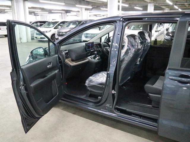 フリード e:HEVエアー EX 登録済み未使用車 マルチビューカメラ 純正11.4インチナビ ETC2.0 BSI・後退出庫サポート アダプティブドライビングビーム 両側電動スライドドア シートヒーター レザー調コンビシート リアクーラー パーキングセンサー 専用アルミ(21枚目)