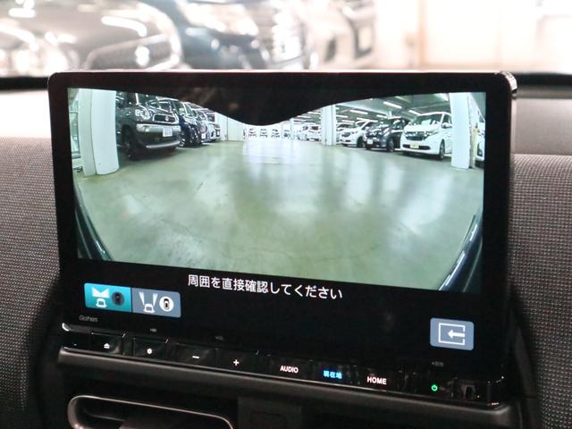 フリード e:HEVエアー EX 登録済み未使用車 マルチビューカメラ 純正11.4インチナビ ETC2.0 BSI・後退出庫サポート アダプティブドライビングビーム 両側電動スライドドア シートヒーター レザー調コンビシート リアクーラー パーキングセンサー 専用アルミ(35枚目)