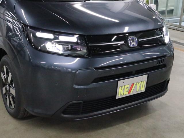 フリード e:HEVエアー EX 登録済み未使用車 マルチビューカメラ 純正11.4インチナビ ETC2.0 BSI・後退出庫サポート アダプティブドライビングビーム 両側電動スライドドア シートヒーター レザー調コンビシート リアクーラー パーキングセンサー 専用アルミ(57枚目)