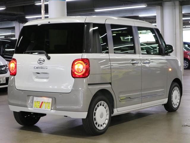 ムーヴキャンバス ストライプスＧターボ　届け出済み未使用車　パノラマモニター　新品ナビ　スマートアシスト　誤発進抑制　アダプティブクルーズ　車線逸脱警報　コーナーセンサー　両側電動スライド　シートヒーター　ホッとカップホルダー　後席置きラクＢＯＸ　ブレーキホールド　ＬＥＤライト（3枚目）