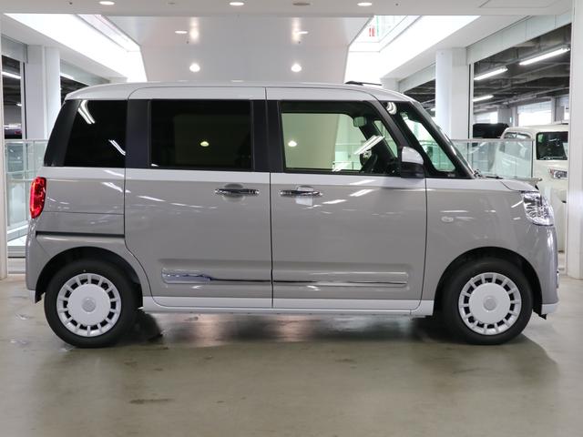 ムーヴキャンバス ストライプスＧターボ　届け出済み未使用車　パノラマモニター　新品ナビ　スマートアシスト　誤発進抑制　アダプティブクルーズ　車線逸脱警報　コーナーセンサー　両側電動スライド　シートヒーター　ホッとカップホルダー　後席置きラクＢＯＸ　ブレーキホールド　ＬＥＤライト（9枚目）