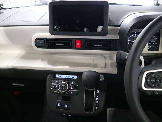 ムーヴキャンバス ストライプスＧターボ　届け出済み未使用車　パノラマモニター　新品ナビ　スマートアシスト　誤発進抑制　アダプティブクルーズ　車線逸脱警報　コーナーセンサー　両側電動スライド　シートヒーター　ホッとカップホルダー　後席置きラクＢＯＸ　ブレーキホールド　ＬＥＤライト（23枚目）