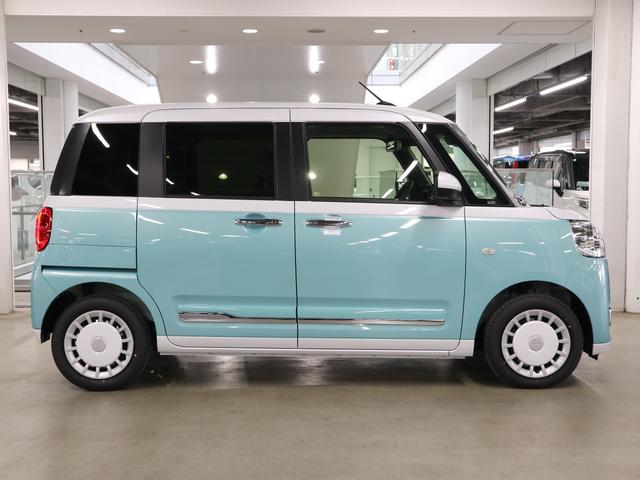 ムーヴキャンバス ストライプスGターボ 届け出済み未使用車 パノラマモニター 新品ナビ スマートアシスト 誤発進抑制 アダプティブクルーズ 車線逸脱警報 コーナーセンサー 両側電動スライド シートヒーター ホッとカップホルダー 後席置きラクBOX ブレーキホールド LEDライト(9枚目)