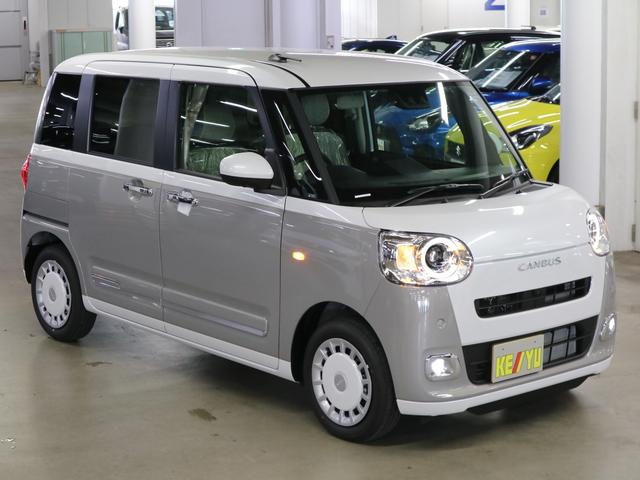 ムーヴキャンバス ストライプスＧターボ　届け出済み未使用車　パノラマモニター　新品ナビ　スマートアシスト　誤発進抑制　アダプティブクルーズ　車線逸脱警報　コーナーセンサー　両側電動スライド　シートヒーター　ホッとカップホルダー　後席置きラクＢＯＸ　ブレーキホールド　ＬＥＤライト（5枚目）