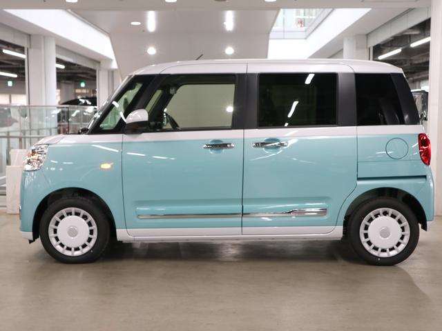 ムーヴキャンバス ストライプスＧターボ　届け出済み未使用車　パノラマモニター　新品ナビ　スマートアシスト　誤発進抑制　アダプティブクルーズ　車線逸脱警報　コーナーセンサー　両側電動スライド　シートヒーター　ホッとカップホルダー　後席置きラクＢＯＸ　ブレーキホールド　ＬＥＤライト（10枚目）