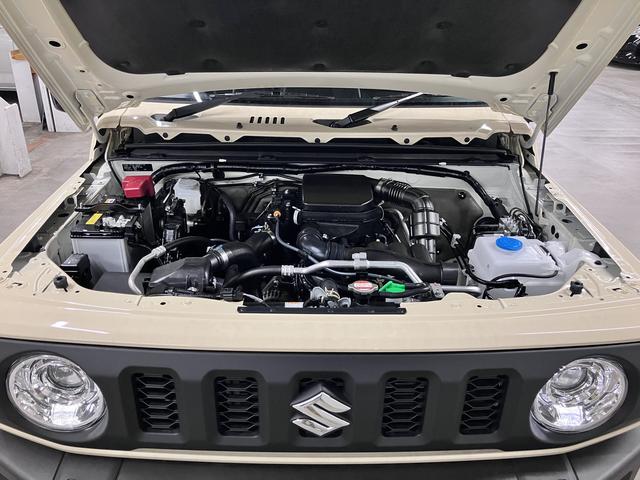 ジムニー ＸＣ　４ＷＤ　ターボ　届け出済み未使用車　改良モデル　デュアルセンサーブレーキサポートＩＩ　全車速追従クルーズコントロール　前後誤発進抑制機能　車線逸脱抑制　パーキングセンサー　シートヒーター　ＬＥＤライト　ハイビームアシスト　純正１６ＡＷ　スマートキー（42枚目）