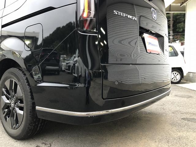 ステップワゴン ｅ：ＨＥＶスパーダ　ホンダセンシング　９インチナビ　ＢＴ・ＵＳＢ・カープレイ接続　マルチビューカメラ　フリップダウンモニター　デジタルミラー　前後ドラレコ　電動ゲート　１タッチＷパワスラ　ヒーター付半革シート　オットマン（64枚目）