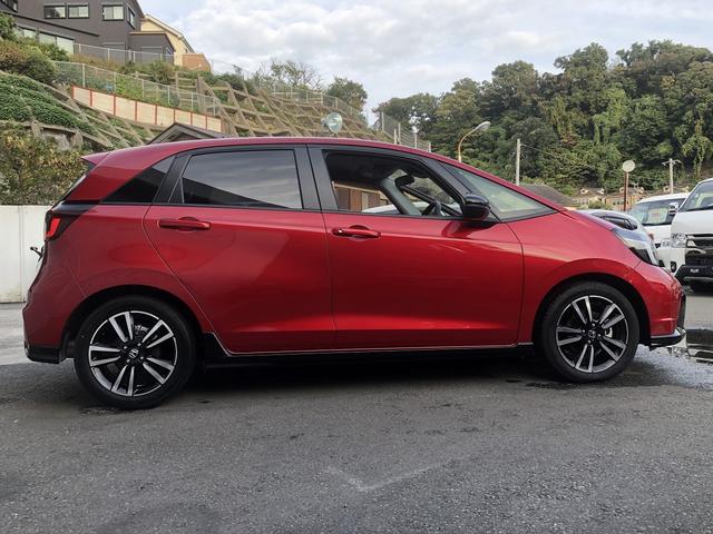 フィット ｅ：ＨＥＶ　ＲＳ　ホンダセンシング　９インチＳＤナビ　フルセグＴＶ　Ｂｌｕｅｔｏｏｔｈ接続　カープレイ　バックカメラ　ハーフレザー　ＥＴＣ２．０　ＬＥＤオートライト　ＵＳＢ充電　パドルシフト　ステアスイッチ　ＣＭＢＳ（6枚目）