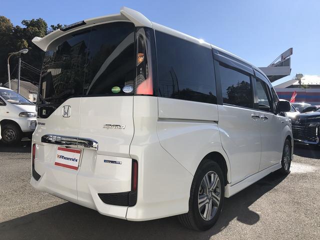 ステップワゴンスパーダ スパーダハイブリッド　Ｇ・ＥＸ　ホンダセンシング　Ｈセンシング　コンフォートビューＰＫＧ　９型ナビ　ＢＴ　ＨＤＭＩ　カープレイ　後席モニター　Ｗ温シート　わくわくゲート　１タッチＷパワスラ　ＬＥＤオートライト・フォグ　前後ドラレコ　ステアＳＷ　ＥＴＣ（7枚目）