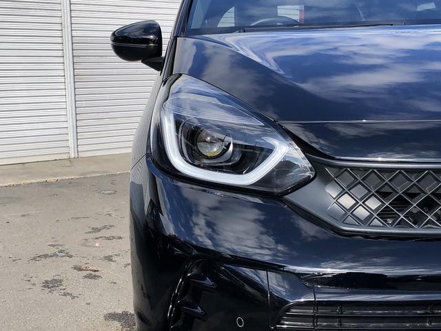 フィット ｅ：ＨＥＶ　ＲＳ　ホンダセンシング　衝突軽減　９型ワイドナビ　ＢＴ　カープレイ　Ｂカメ　Ｐソナー　前後ドラレコ　ステアＳＷ　パドルシフト　ＬＥＤオートライト　ＬＫＡＳ　ＡＣＣ　誤発進抑制　オートハイビーム　ＥＴＣ２．０（12枚目）