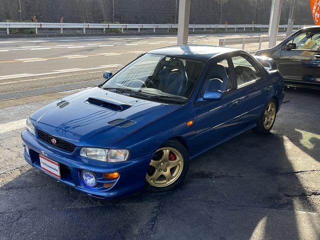 インプレッサ WRXタイプRA リミテッド 修復歴無し・特別仕様車・1000台限定車・シリアルNO803・純正エアロ・大型リアスポ・16アルミ・専用555シート・ETC・柿本改マフラー・ブリッツ車高調・タイミングベルト交換済み(8枚目)