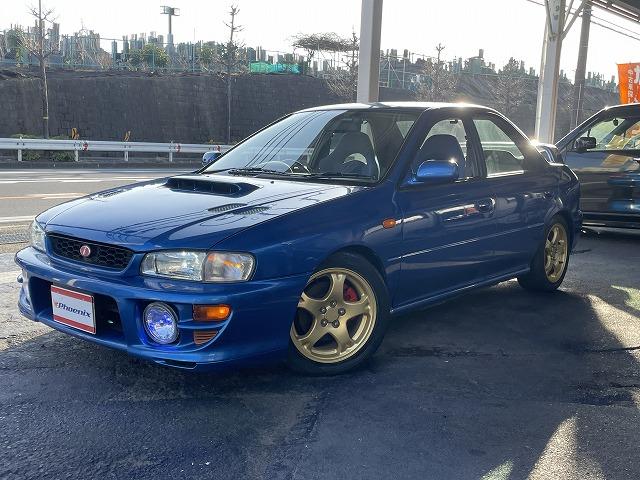 インプレッサ WRXタイプRA リミテッド 修復歴無し・特別仕様車・1000台限定車・シリアルNO803・純正エアロ・大型リアスポ・16アルミ・専用555シート・ETC・柿本改マフラー・ブリッツ車高調・タイミングベルト交換済み(9枚目)