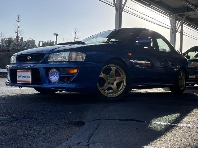 インプレッサ WRXタイプRA リミテッド 修復歴無し・特別仕様車・1000台限定車・シリアルNO803・純正エアロ・大型リアスポ・16アルミ・専用555シート・ETC・柿本改マフラー・ブリッツ車高調・タイミングベルト交換済み(10枚目)