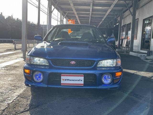 インプレッサ WRXタイプRA リミテッド 修復歴無し・特別仕様車・1000台限定車・シリアルNO803・純正エアロ・大型リアスポ・16アルミ・専用555シート・ETC・柿本改マフラー・ブリッツ車高調・タイミングベルト交換済み(12枚目)