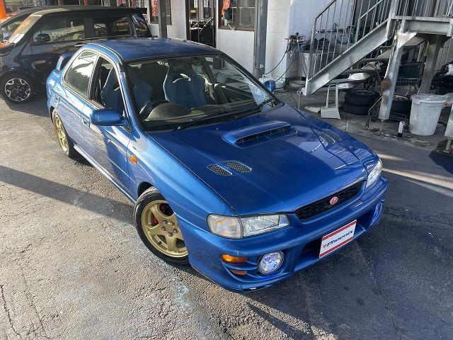 インプレッサ WRXタイプRA リミテッド 修復歴無し・特別仕様車・1000台限定車・シリアルNO803・純正エアロ・大型リアスポ・16アルミ・専用555シート・ETC・柿本改マフラー・ブリッツ車高調・タイミングベルト交換済み(14枚目)