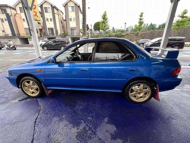 インプレッサ ＷＲＸ　ＲＡ　ＳＴｉバージョンＩＶ　Ｖ　ＬＴＤ　修復歴無し・純正５速ＭＴ・タイベル交換済み・ブリッツ車高調・スピードライン１６アルミ・フジツボマフラー・ルーフベンチレーター・ＳＴＩマッドフラップ・ＳＴＩタワーバー・ＳＴＩセミバケ・社外キーレス・（21枚目）