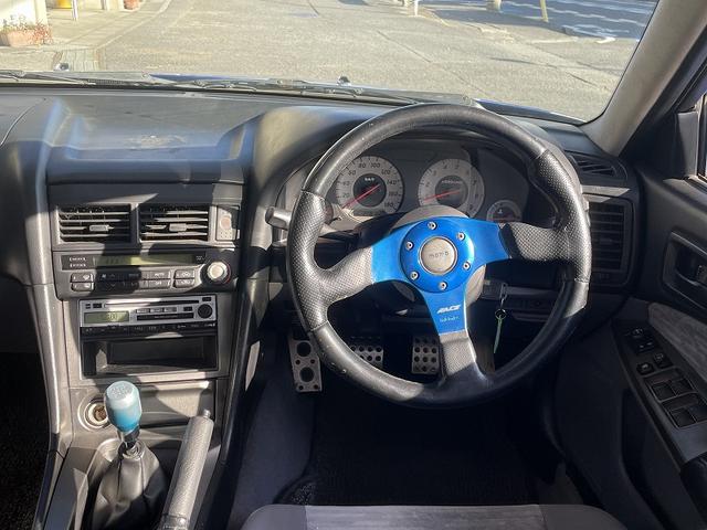 スカイライン ＧＴ　修復歴無し・純正５速ＭＴ車・純正ベイサイドブルー・タイミングベルト交換済み（２０２３．１０．１１．２０２８２６ｋｍ時）・ＭＯＭＯステアリング・柿本改マフラー・ＥＴＣ・（65枚目）