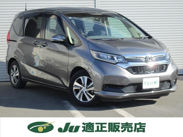 フリードハイブリッド ハイブリッド・Ｇホンダセンシング　純正９型ナビＴＶ・バックカメラ・ＨｏｎｄａＳＥＮＳＩＮＧ・両側電動スライドドア・シートヒーター・前後ドラレコ・追従クルーズコントロール・ＡｐｐｌｅＣａｒｐｌａｙ・Ｂｌｕｅｔｏｏｔｈ・ＵＳＢ・禁煙車（6枚目）