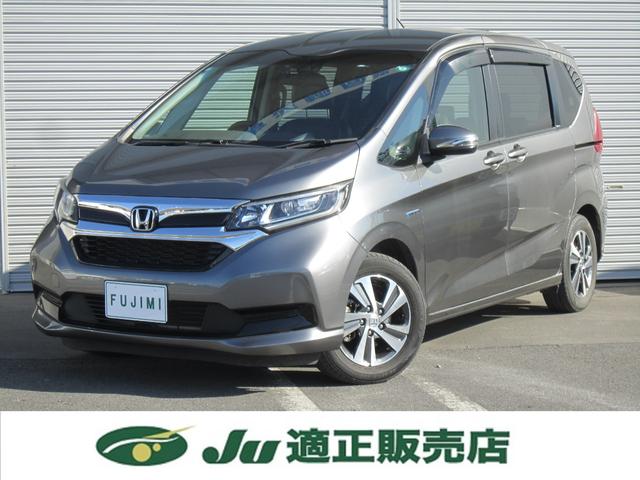 フリードハイブリッド ハイブリッド・Ｇホンダセンシング　純正９型ナビＴＶ・バックカメラ・ＨｏｎｄａＳＥＮＳＩＮＧ・両側電動スライドドア・シートヒーター・前後ドラレコ・追従クルーズコントロール・ＡｐｐｌｅＣａｒｐｌａｙ・Ｂｌｕｅｔｏｏｔｈ・ＵＳＢ・禁煙車（7枚目）