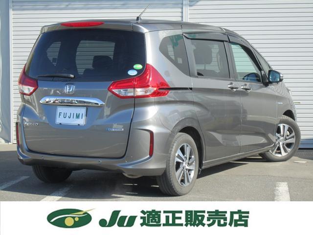 フリードハイブリッド ハイブリッド・Ｇホンダセンシング　純正９型ナビＴＶ・バックカメラ・ＨｏｎｄａＳＥＮＳＩＮＧ・両側電動スライドドア・シートヒーター・前後ドラレコ・追従クルーズコントロール・ＡｐｐｌｅＣａｒｐｌａｙ・Ｂｌｕｅｔｏｏｔｈ・ＵＳＢ・禁煙車（8枚目）