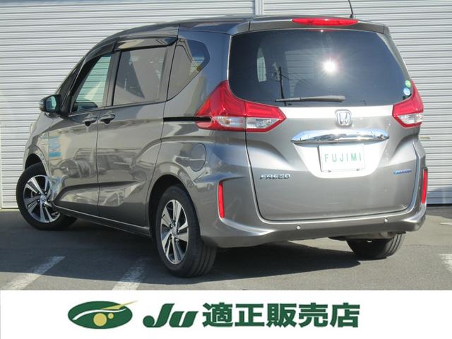 フリードハイブリッド ハイブリッド・Ｇホンダセンシング　純正９型ナビＴＶ・バックカメラ・ＨｏｎｄａＳＥＮＳＩＮＧ・両側電動スライドドア・シートヒーター・前後ドラレコ・追従クルーズコントロール・ＡｐｐｌｅＣａｒｐｌａｙ・Ｂｌｕｅｔｏｏｔｈ・ＵＳＢ・禁煙車（9枚目）
