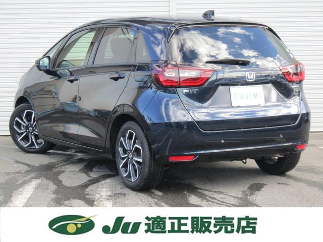 フィット ｅ：ＨＥＶネス　純正９インチナビ・バックカメラ・ＥＴＣ・前後ドラレコ・クルーズコントロール・Ｂｌｕｅｔｏｏｔｈ・ＬＥＤフォグランプ・電動パーキング・ソナー・レーンキープアラート・スマートキー・禁煙車・記録簿（9枚目）