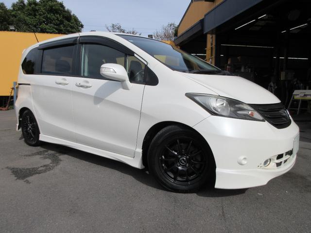 フリード Gi エアロ ジャストセレクション コンフォートパッケージ 純正HDDナビ バックカメラ 地デジTV ETC 両側パワースライドドア スマートキー HIDヘッドライト フォグランプ 純正エアロ ダウンサス 社外AW(8枚目)