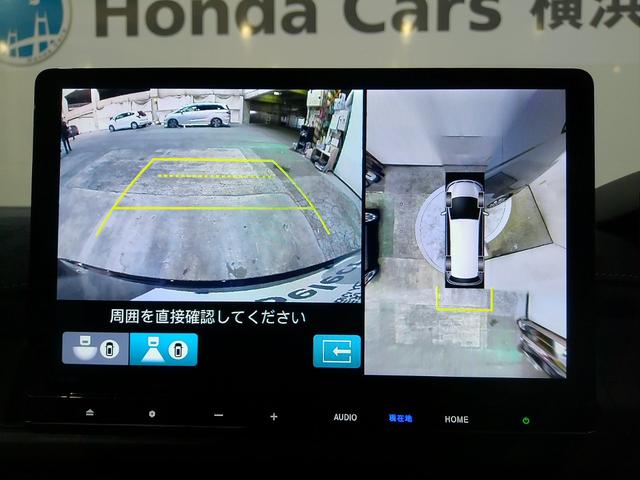 ステップワゴン ｅ：ＨＥＶスパーダプレミアムライン　７人　マルチビューカメラ　前後ドラレコ　メモリーナビ　Ｂｌｕｅｔｏｏｔｈ　ＥＴＣ　ＬＥＤヘッドライト・フォグライト　オートライト　シートヒーター　ブラインドスポットインフォメーション　ＵＳＢ　Ｆセグ（12枚目）